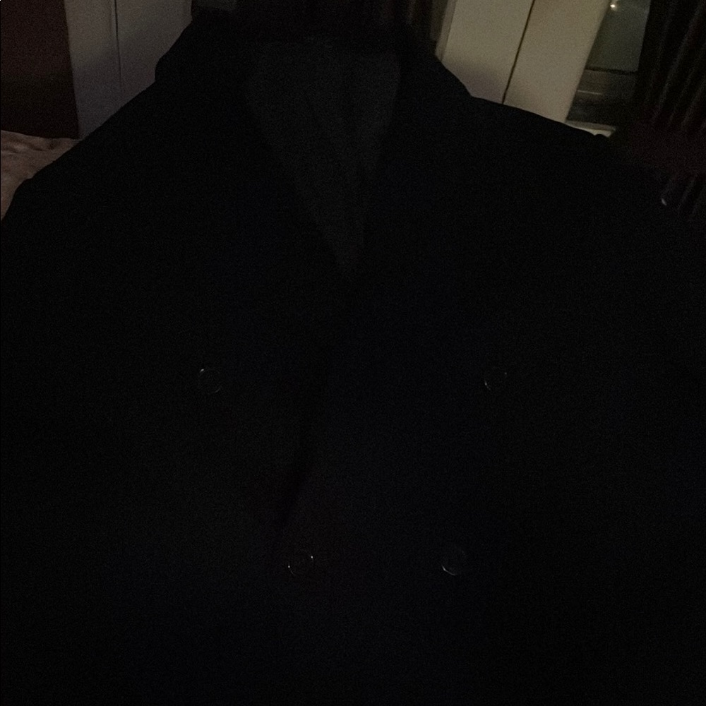 Sleek Black Jacket with Timeless Elegance